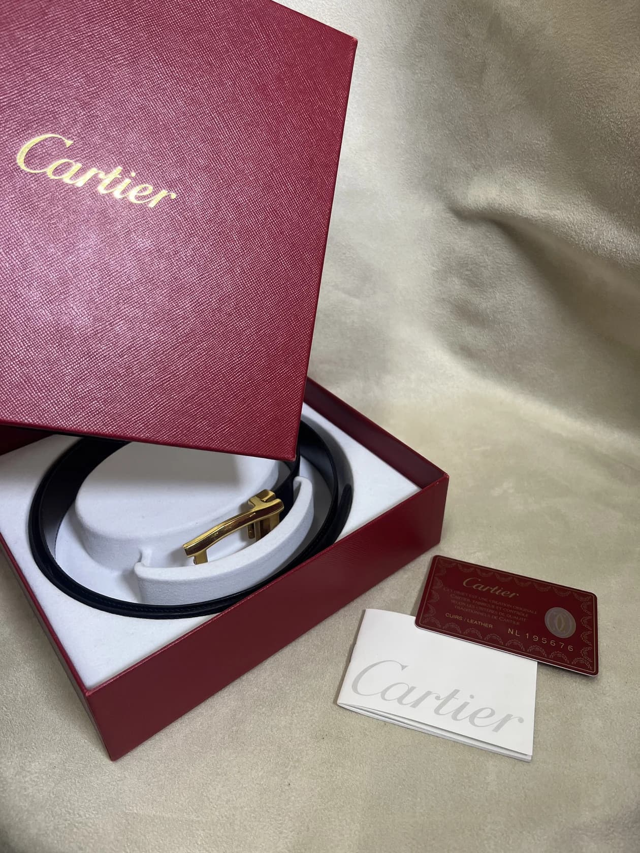 Ремень Cartier, черная кожа с шоколадной изнанкой