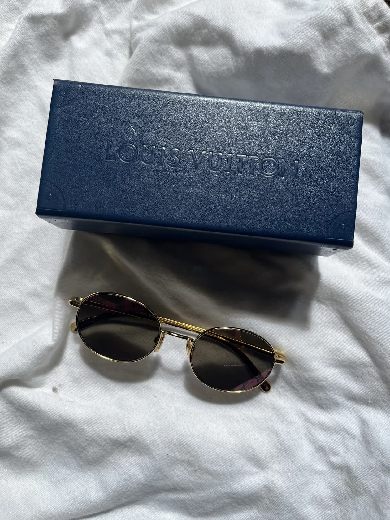 Очки Louis Vuitton с монограммой на линзах